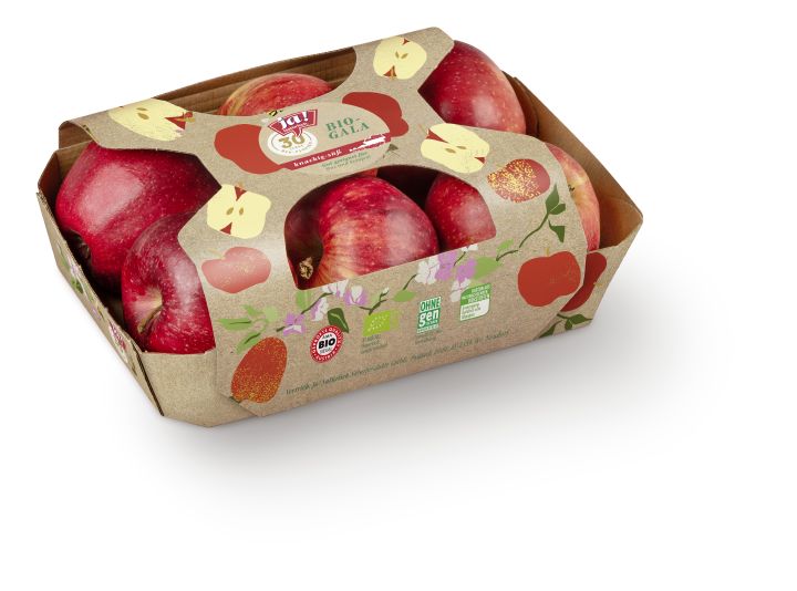 A pack containing several red apples, nestled in a brown cardboard box featuring colourful apple designs and organic labels.